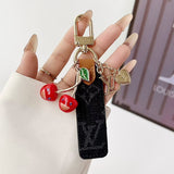 louis vuitton Cherry Charm Keychain with Monogram Leather Strap Luxury Designer Bag and Key Accessory