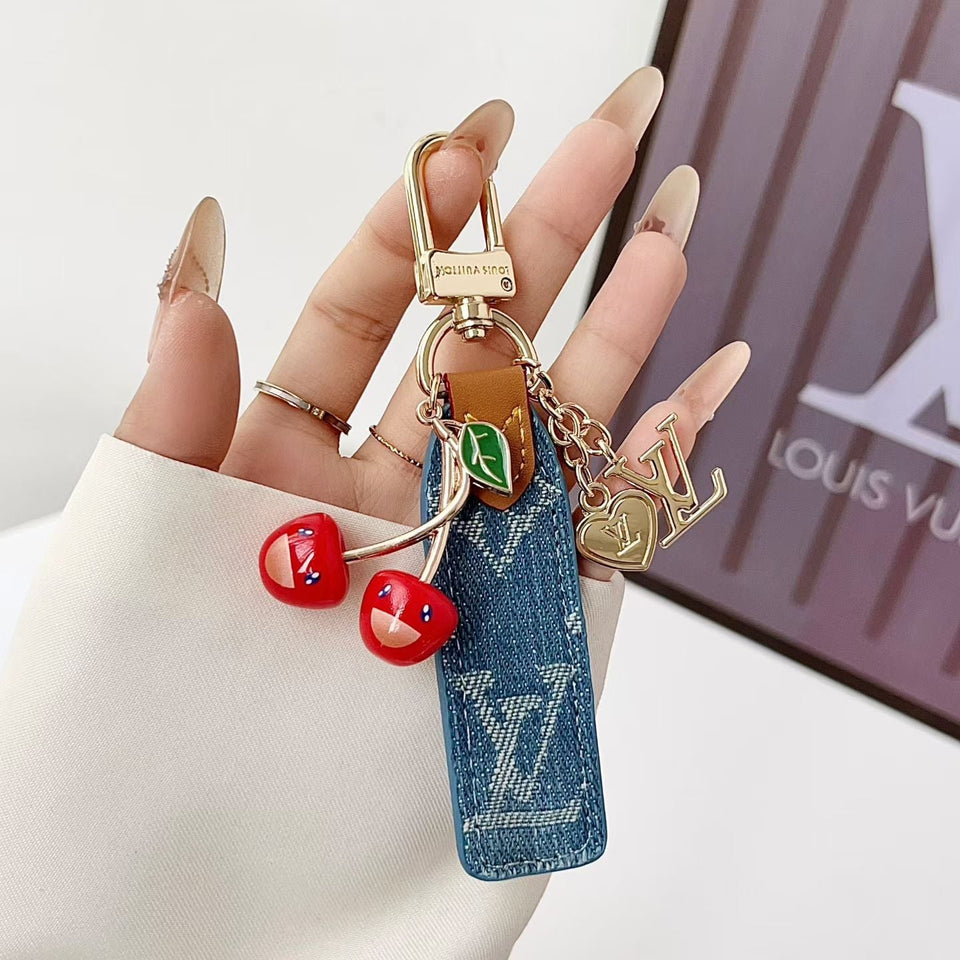 louis vuitton Cherry Charm Keychain with Monogram Leather Strap Luxury Designer Bag and Key Accessory
