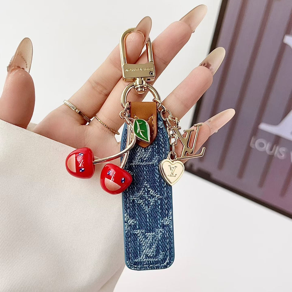 louis vuitton Cherry Charm Keychain with Monogram Leather Strap Luxury Designer Bag and Key Accessory