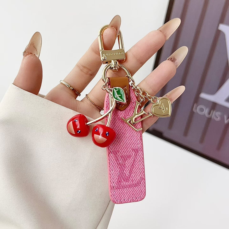 louis vuitton Cherry Charm Keychain with Monogram Leather Strap Luxury Designer Bag and Key Accessory