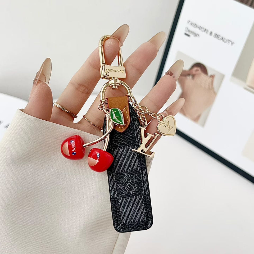 louis vuitton Cherry Charm Keychain with Monogram Leather Strap Luxury Designer Bag and Key Accessory