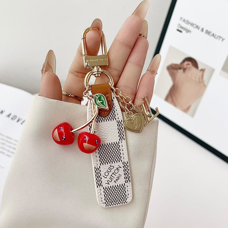 louis vuitton Cherry Charm Keychain with Monogram Leather Strap Luxury Designer Bag and Key Accessory
