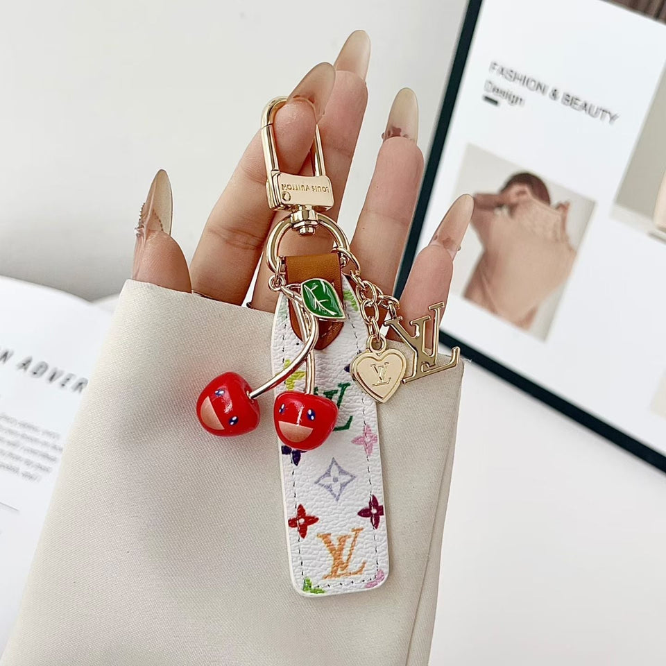 louis vuitton Cherry Charm Keychain with Monogram Leather Strap Luxury Designer Bag and Key Accessory