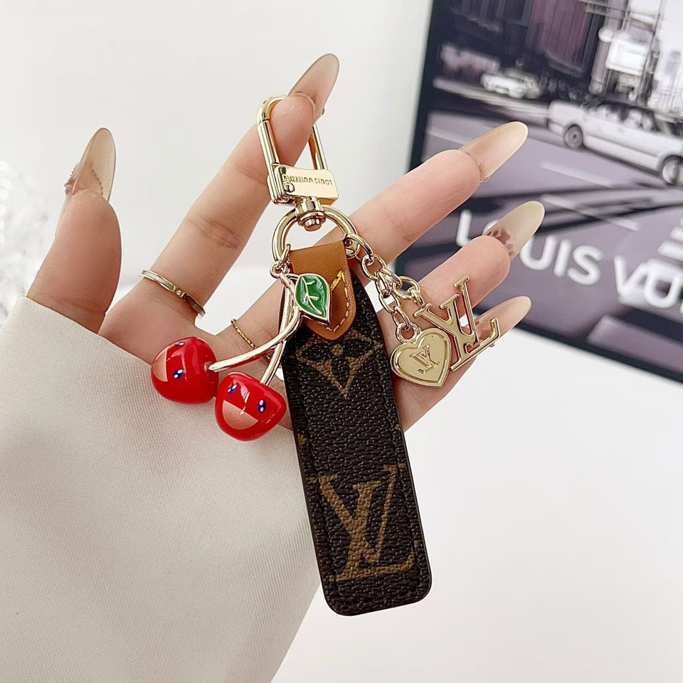 louis vuitton Cherry Charm Keychain with Monogram Leather Strap Luxury Designer Bag and Key Accessory