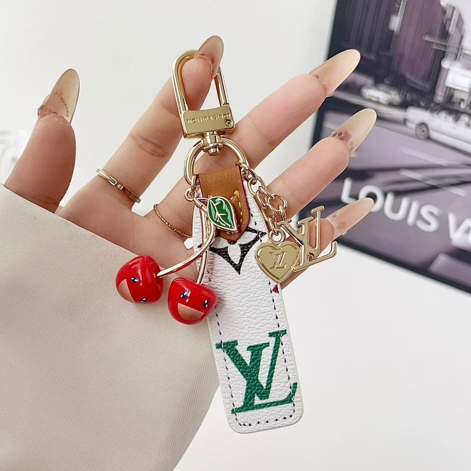 louis vuitton Cherry Charm Keychain with Monogram Leather Strap Luxury Designer Bag and Key Accessory