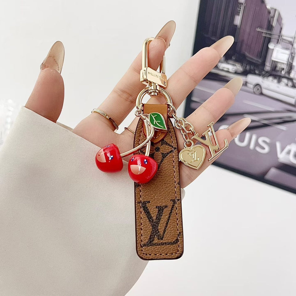 louis vuitton Cherry Charm Keychain with Monogram Leather Strap Luxury Designer Bag and Key Accessory
