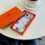 Hermès Floral Signature Case with Wrist Charm for iPhone 13 to 17 Pro Max