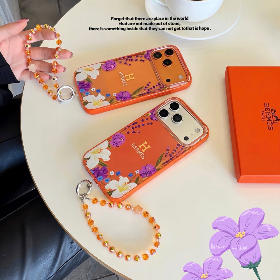 Hermès Floral Signature Case with Wrist Charm for iPhone 13 to 17 Pro Max