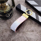 Tunde Store Louis Vuitton Pastel Monogram Key Holders with Gold Accents | LV Keychain