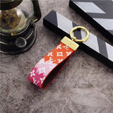 Tunde Store Louis Vuitton Pastel Monogram Key Holders with Gold Accents | LV Keychain