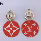 Tunde Store Louis Vuitton Rounded Leather Keychain | Bag Keychain